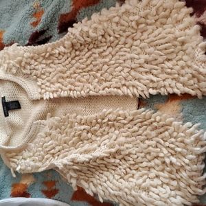 Large wool vest, design history